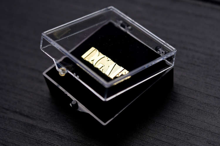 Die struck lapel pin with acrylic case